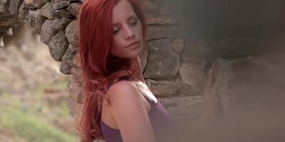 Pale redhead shows off her impeccable hips and her titties