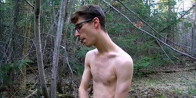 Nature loving twink Sacha West works a load among the trees
