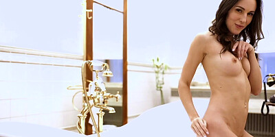 Russian sweetheart takes a bubble bath in her bathroom