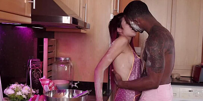 Girl stops cooking to enjoy dessert in the form of big black cock