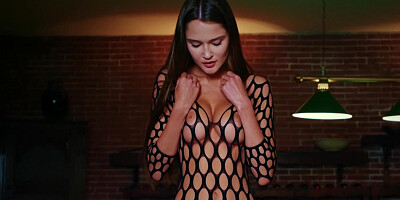 Sonya Blazes fishnet bodysuit has a hole where her pussy is so she uses it to play