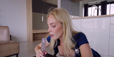 Sexy blonde in cop costume masturbates with big rubber cock