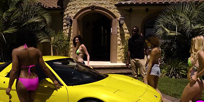 Hot ebony babe and MILF posed by the car