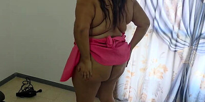 Masturbation in a pink dress