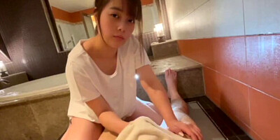 Cute college student massages her boyfriend's body