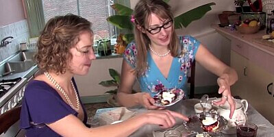 Naughty blondes lick each other's pussy and ass in the kitchen