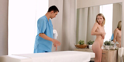 Beautiful blonde girl gets a massage from a pervert