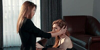 Gorgeous redhead fucks her girlfriend with strapless dildo