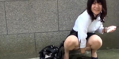 NipponPissTV.com - Naughty Japanese babe peeing outdoors for voyeur pleasure on camera