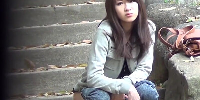 NipponPissTV.com - Mixing enjoyment and peeing for this adorable Chinese stunner outdoors