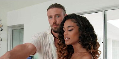 Hot beauty in a tiny bikini bouncing on white dick