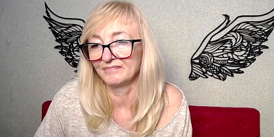 Blonde amateur MILF IngritSno with glasses on webcam