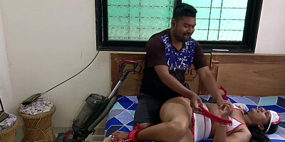 Cosplaying as a nurse while getting frisky with her man