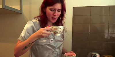 Redheaded girl is going to lick that brunette's pussy