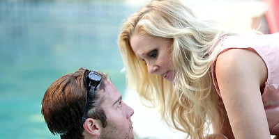 A blonde milf is getting penetrated by a handsome young dude