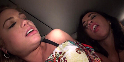 Two women with large tits are receiving a dick in a hot threesome