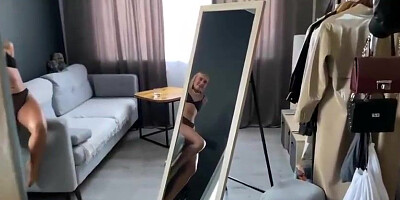 Stellar blond stunner is dressed in black undergarments while getting down on all fours on the floor and throating trunk