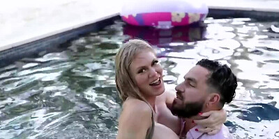 Busty blonde MILF and horny stud have fun in swimming pool