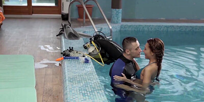 Alexis Brill and diving instructor are making out by the pool