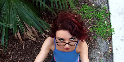 Skinny redhead is ready for sex in a public place on camera