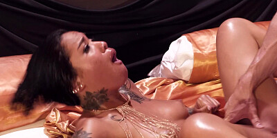 Oiled up beauty Honey Gold fucks his big cock eagerly