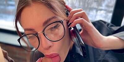 Hot slut talking on the phone with her husband while her friend fucks her.