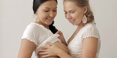 A couple of girls are showing their love for a dick in the room