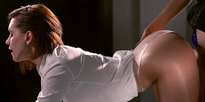 Jerking her girlfriend's strapon until it sprays her with cum