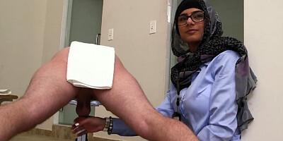 Mia Khalifa is milking a lot of cocks and she collects the semen