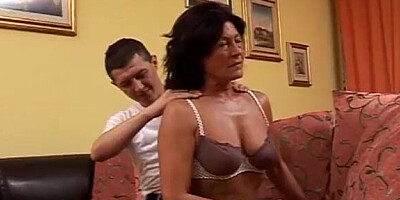 Milf fucks in kitchen