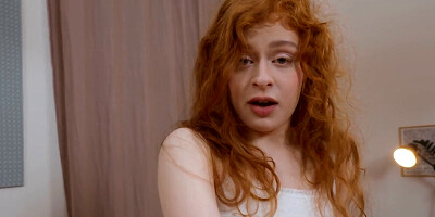 Teen redhead plays with her pussy and tits on the table