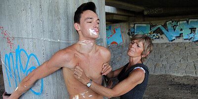 Horny GILF tapes her young fucker to suck him off