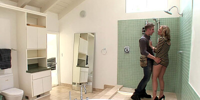 Blonde chick gets banged under the shower by two horny blokes