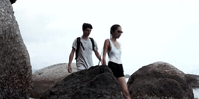 Asian cutie is blowing a complete stranger at the beach