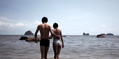 Asian cutie is blowing a complete stranger at the beach