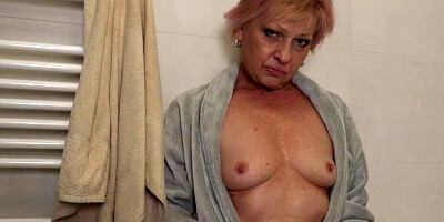 Oiled-up grandma playing with herself in the shower