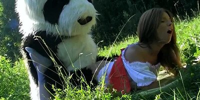A guy in a panda suit is ramming a sexy brunette with his dick
