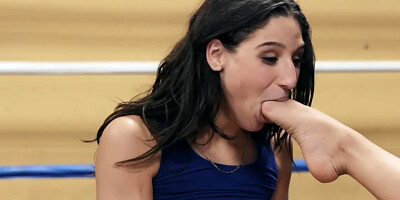 Two hot girls are fucking one guy in a boxing ring
