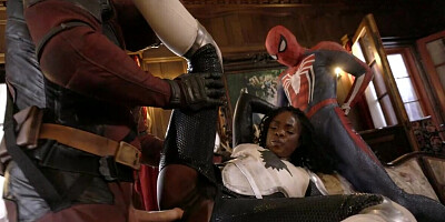 Two superhero hunks are having their way with a black babe