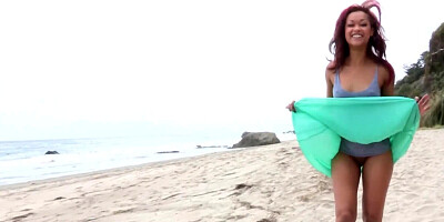 Spicy black girl is playing with her wet pussy outside