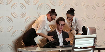 Two beautiful office workers show boss that he needs some rest