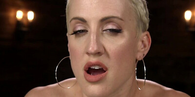 Fucking machine drives short-haired blonde to squirting orgasm