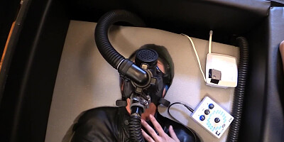 Perverted mistress is torturing slave gimp with electro shocks