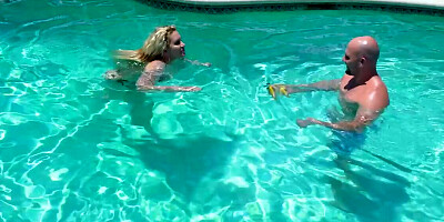 Busty blonde Ryan Conner and JMac are fucking in the pool