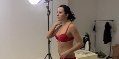 Lingerie model is being teased into stripping naked