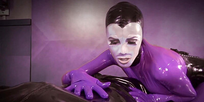 Cuple in Latex is doing naughty stuff in BDSM dungeon