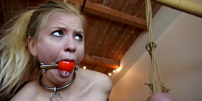 Blonde girl is tied up Shibari style and tortured by a mistress