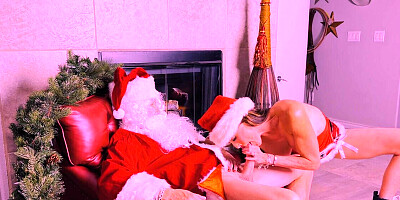 Naughty MILF with big tits slaying Santa's boner