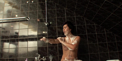 Brunette beauty shares soapy moments of raw pussy masturbation
