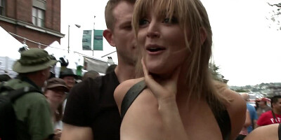 Blonde girl is walking tied up and naked on the street